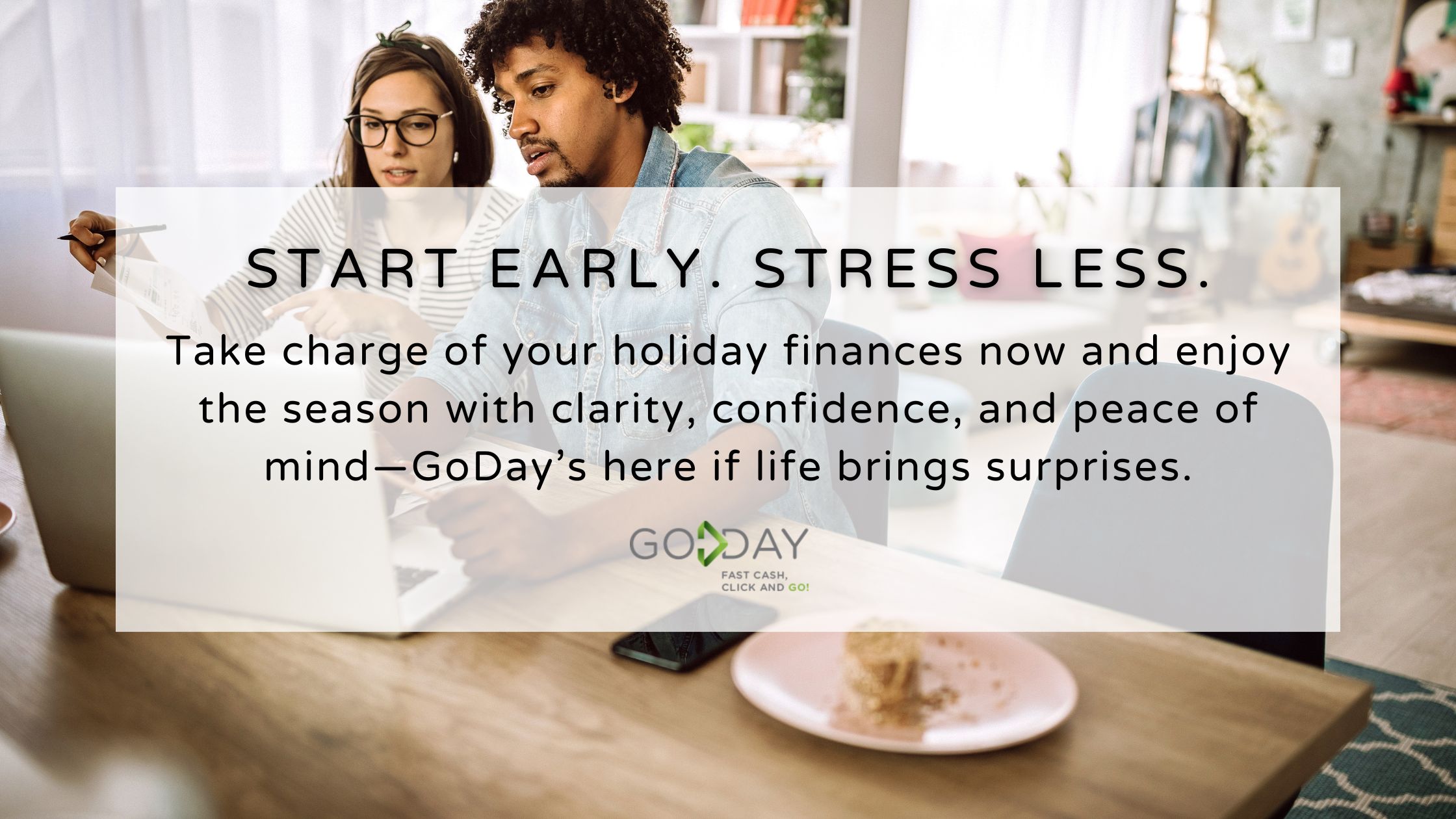 Man and woman planning holiday finances together at home, illustrating GoDay’s message to start early and manage seasonal spending with confidence and peace of mind.