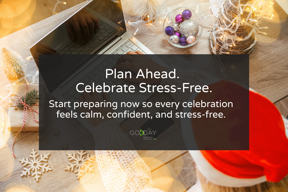 Hands typing on a laptop at a festive holiday workspace with ornaments and snowflakes, encouraging early financial planning for stress-free celebrations.