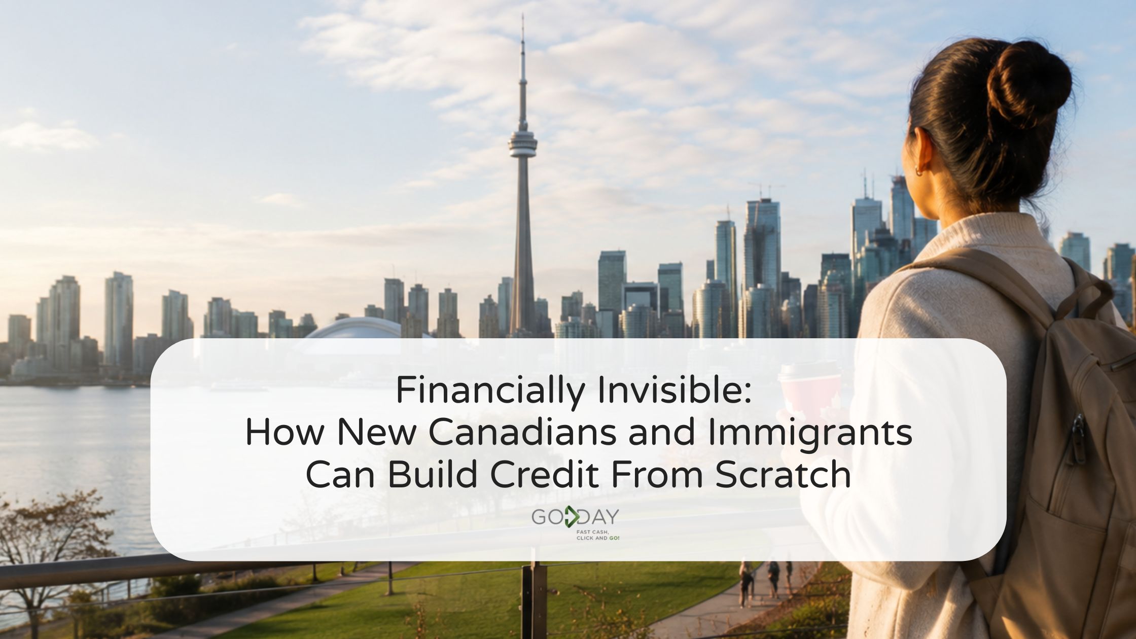New Canadian overlooking the Toronto skyline while beginning their financial journey and learning how to build credit history in Canada from scratch.